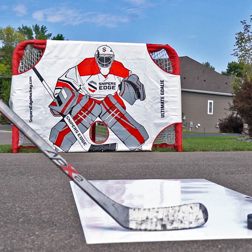 Ultimate Goalie set up outside on driveway goal